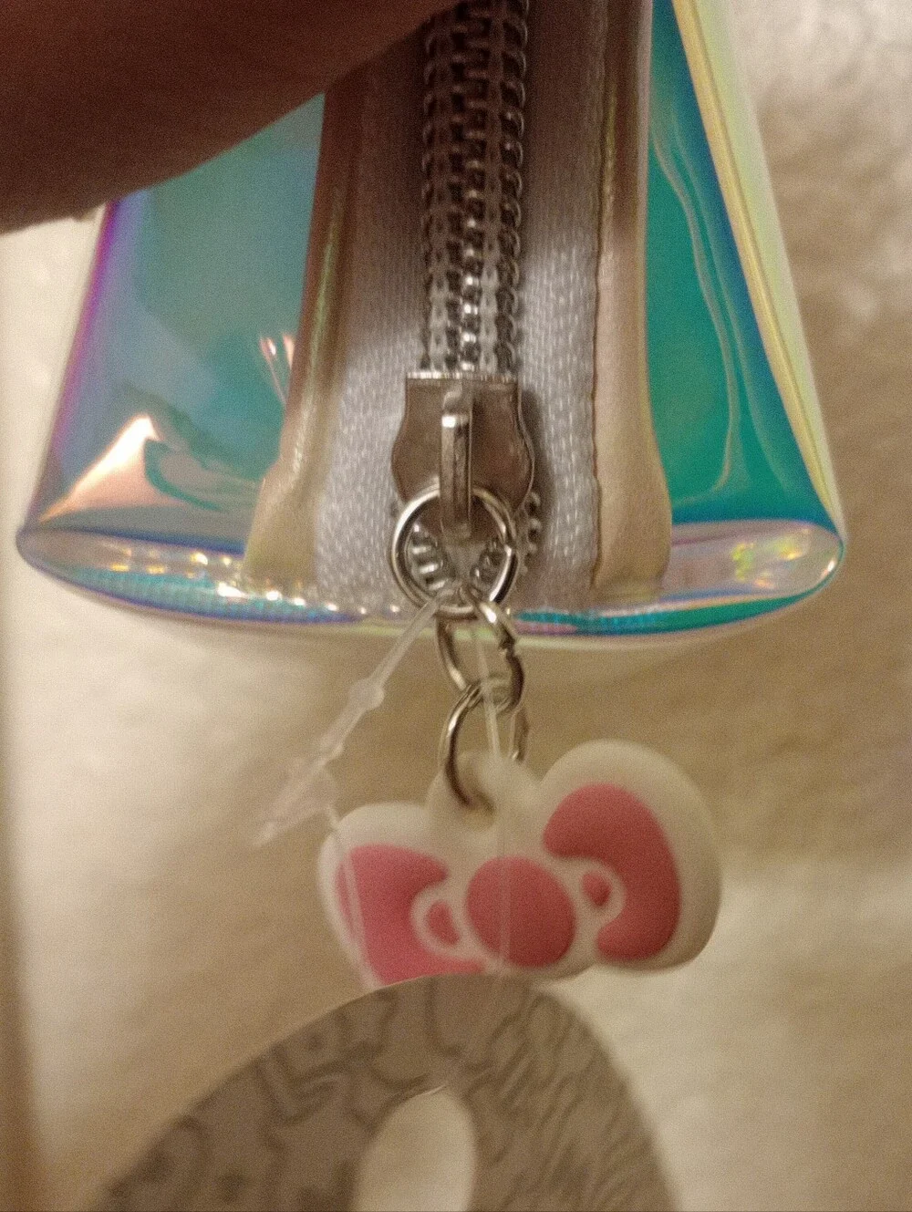 Hello Kitty Iridescent Holographic Cosmetic Pouch with Pink Bow Zipper  Accent